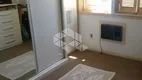 Foto 12 de Casa com 4 Quartos à venda, 374m² em Vila Assunção, Porto Alegre