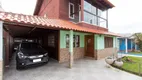 Foto 2 de Casa com 4 Quartos à venda, 223m² em Vila Nova, Porto Alegre