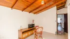 Foto 13 de Casa com 5 Quartos à venda, 271m² em Vila Nova, Porto Alegre