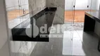 Foto 9 de Casa com 3 Quartos à venda, 110m² em Jardim Europa, Uberlândia