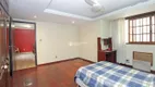 Foto 13 de Casa de Condomínio com 4 Quartos à venda, 243m² em Teresópolis, Porto Alegre