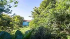 Foto 11 de Casa com 6 Quartos à venda, 394m² em Vila Nova, Porto Alegre