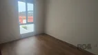 Foto 14 de Casa de Condomínio com 3 Quartos à venda, 185m² em Vila Nova, Porto Alegre