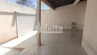 Foto 3 de Casa com 4 Quartos à venda, 137m² em Santa Mônica, Uberlândia