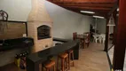 Foto 13 de Casa com 4 Quartos à venda, 408m² em Vigilato Pereira, Uberlândia