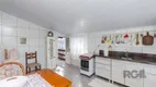 Foto 17 de Casa com 5 Quartos à venda, 270m² em Vila Nova, Porto Alegre