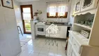 Foto 2 de Casa de Condomínio com 4 Quartos à venda, 153m² em Capivari, Campos do Jordão