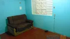 Foto 10 de Casa com 4 Quartos à venda, 200m² em Guajuviras, Canoas