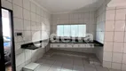 Foto 13 de Casa com 3 Quartos para alugar, 151m² em Tubalina, Uberlândia
