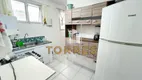 Foto 11 de Apartamento com 2 Quartos à venda, 65m² em Praia das Pitangueiras, Guarujá