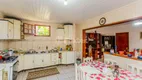 Foto 6 de Casa com 4 Quartos à venda, 245m² em Rio Branco, Canoas