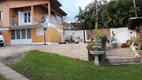 Foto 2 de Casa com 4 Quartos à venda, 273m² em Vila Nova, Porto Alegre