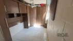 Foto 15 de Apartamento com 2 Quartos à venda, 37m² em Vila Nova, Porto Alegre