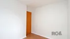 Foto 2 de Apartamento com 2 Quartos à venda, 46m² em Vila Nova, Porto Alegre