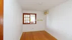 Foto 19 de Casa de Condomínio com 4 Quartos à venda, 240m² em Tristeza, Porto Alegre