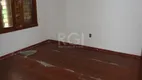 Foto 5 de Casa com 4 Quartos à venda, 299m² em Santa Fé, Porto Alegre