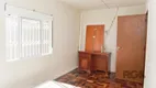 Foto 12 de Casa com 5 Quartos à venda, 198m² em Santa Fé, Porto Alegre