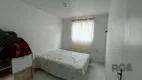 Foto 9 de Apartamento com 2 Quartos à venda, 44m² em Vila Nova, Porto Alegre