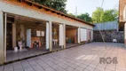 Foto 21 de Casa com 5 Quartos à venda, 272m² em Vila Nova, Porto Alegre