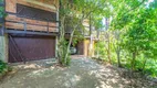 Foto 2 de Casa com 4 Quartos à venda, 388m² em Vila Nova, Porto Alegre
