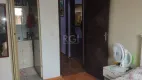 Foto 16 de Casa com 4 Quartos à venda, 299m² em Vila Nova, Porto Alegre