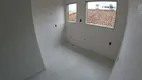 Foto 4 de Casa com 2 Quartos à venda, 51m² em Aviação, Praia Grande