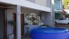 Foto 18 de Casa com 5 Quartos à venda, 420m² em Vila Nova, Porto Alegre