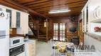 Foto 10 de Casa com 4 Quartos à venda, 224m² em Vila Nova, Porto Alegre