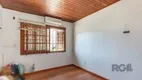 Foto 11 de Casa com 4 Quartos à venda, 236m² em Santa Fé, Porto Alegre