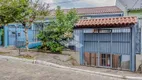 Foto 2 de Casa com 4 Quartos à venda, 244m² em Vila Nova, Porto Alegre
