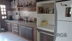 Foto 19 de Casa com 3 Quartos à venda, 144m² em Vila Nova, Porto Alegre