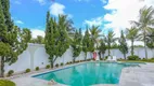 Foto 2 de Casa de Condomínio com 5 Quartos para venda ou aluguel, 600m² em Jardim Acapulco , Guarujá