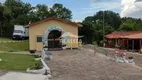 Foto 10 de Casa de Condomínio com 2 Quartos à venda, 52m² em Tarumã, Viamão