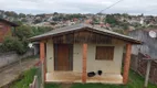 Foto 2 de Casa com 6 Quartos à venda, 165m² em Tarumã, Viamão