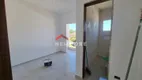 Foto 11 de Casa de Condomínio com 2 Quartos à venda, 80m² em Massaguaçu, Caraguatatuba
