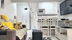 Foto 2 de Apartamento com 2 Quartos à venda, 60m² em Praia das Pitangueiras, Guarujá