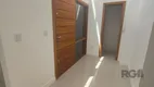 Foto 2 de Casa de Condomínio com 3 Quartos à venda, 184m² em Vila Nova, Porto Alegre