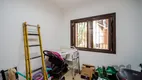 Foto 43 de Casa com 4 Quartos à venda, 246m² em Santa Fé, Porto Alegre