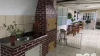 Foto 16 de Casa com 3 Quartos à venda, 89m² em Santa Fé, Porto Alegre