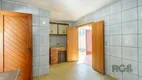 Foto 36 de Casa com 3 Quartos à venda, 128m² em Vila Nova, Porto Alegre