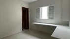 Foto 9 de Casa com 4 Quartos à venda, 160m² em Santa Mônica, Uberlândia