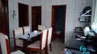 Foto 2 de Sobrado com 4 Quartos à venda, 200m² em Jardim das Palmeiras, Uberlândia