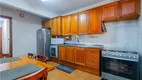 Foto 11 de Casa de Condomínio com 4 Quartos à venda, 195m² em Teresópolis, Porto Alegre