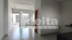 Foto 3 de Casa com 3 Quartos à venda, 119m² em Novo Mundo, Uberlândia