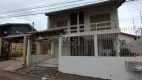 Foto 2 de Casa com 4 Quartos à venda, 182m² em Campo Novo, Porto Alegre