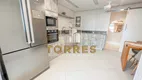 Foto 17 de Apartamento com 4 Quartos à venda, 190m² em Praia das Pitangueiras, Guarujá