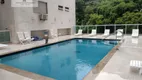 Foto 4 de Apartamento com 3 Quartos à venda, 95m² em Praia das Pitangueiras, Guarujá