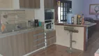 Foto 9 de Casa com 4 Quartos à venda, 299m² em Vila Nova, Porto Alegre