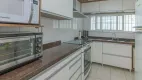 Foto 10 de Casa de Condomínio com 3 Quartos à venda, 185m² em Agronomia, Porto Alegre