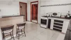 Foto 14 de Casa com 3 Quartos à venda, 159m² em Jardim das Palmeiras, Uberlândia